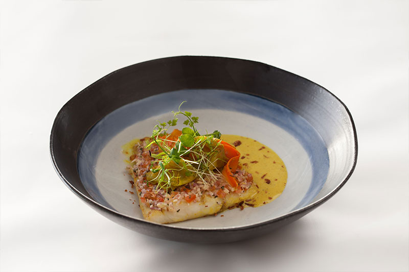Dine & Wine Bali Best Restaurants & Culinary Guide Bali Segaran Dining Terrace  at Jumeirah Bali Red Snapper Turmeric Cream Sauce