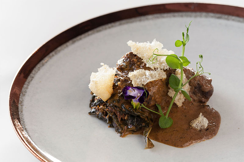 Dine & Wine Bali Best Restaurants & Culinary Guide Bali Segaran Dining Terrace  at Jumeirah Bali Beef Cheek Rendang
